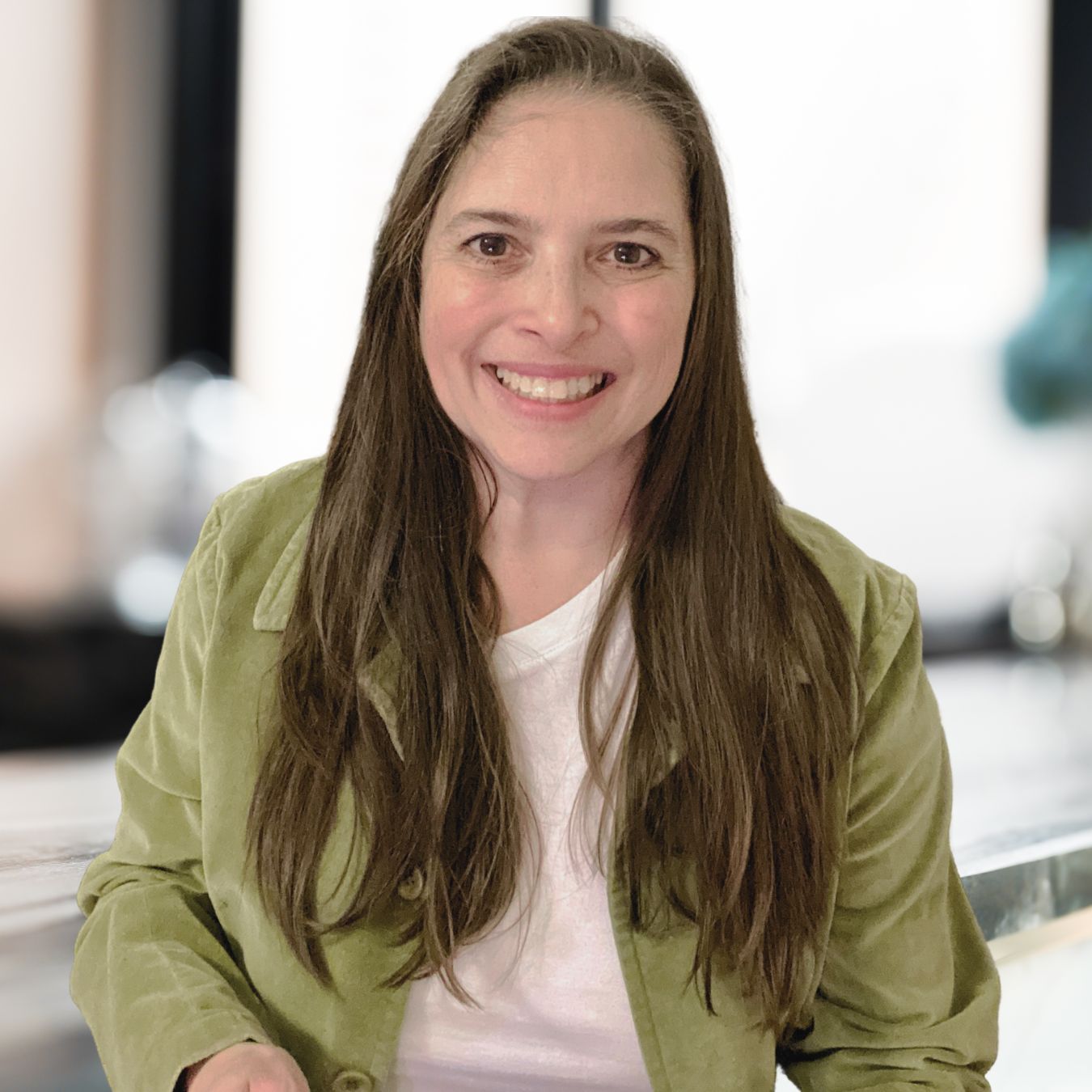 Allison Ishman, LMT — demonstrating lymphatic drainage technique